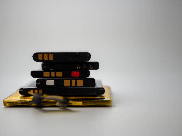 istock Old phone batteries. Replaceable batteries. Phone batteries. 1414794009