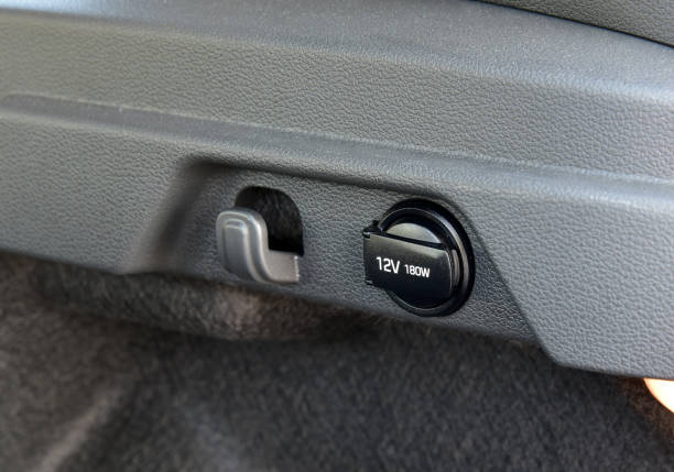 istock 12 Volts power outlet socket in the car 1414794763