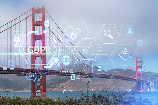 The iconic view of the Golden Gate Bridge from South side at day time, San Francisco, California, United States. GDPR hologram, concept of data protection regulation and privacy for all individuals