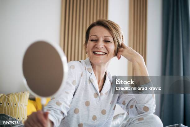 Senior Woman In Bed Stock Photo - Download Image Now - Mature Women, Mirror - Object, Hair