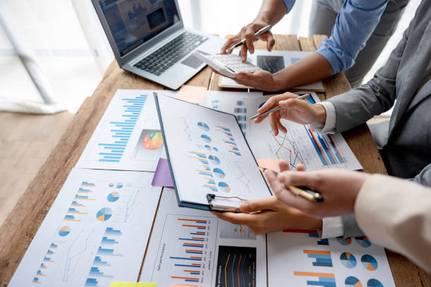 istock Business team meeting and presenting business results discussion and analysis data chart and graph, finance and accounting. Business performance concept. 1414804094