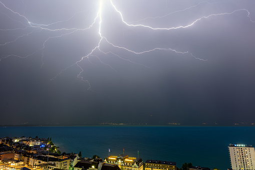 Montreux, Switzerland – July 1, 2019: storm and lightning on Lake Geneva
