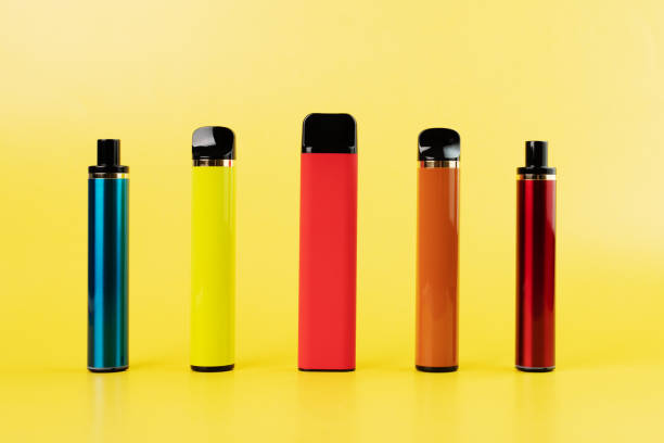 istock disposable vape, electronic cigarettes, smoking devices on a yellow background 1414806988