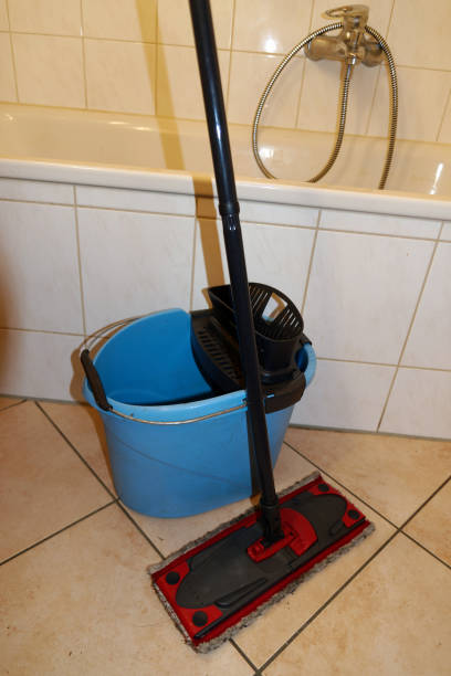 istock Cleaning bucket and mop in the bathroom 1414809440