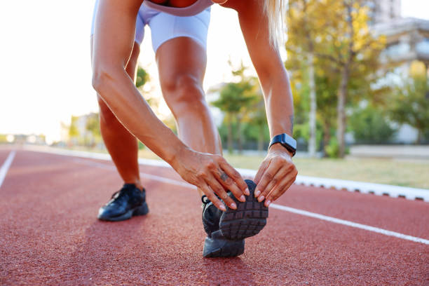 istock Woman running in urban environment 1414809450