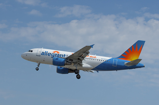 Los Angeles, California, USA - July 19, 2015: image of Allegiant Air Airbus A319 jet with registration N310NV shown leaving from Los Angeles International Airport, LAX