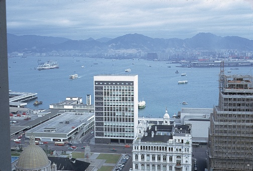 British Hong Kong, China, 1966. British Hong Kong Bay with shipping traffic and new (modern) buildings.