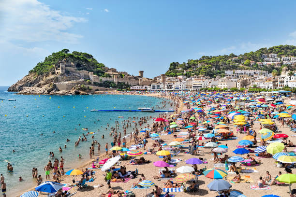 istock Catalunya,  Tossa de Mar, Spain: 08.14.2022; The summer beach in Tossa de mar 1414817377