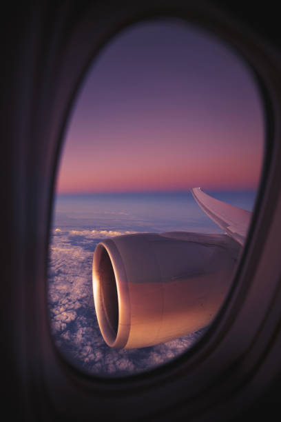 istock View from window of airplane during night flight 1414817526