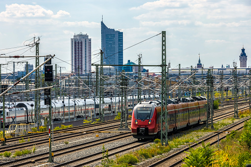 Train in Leipzig, with the Skyline in the background