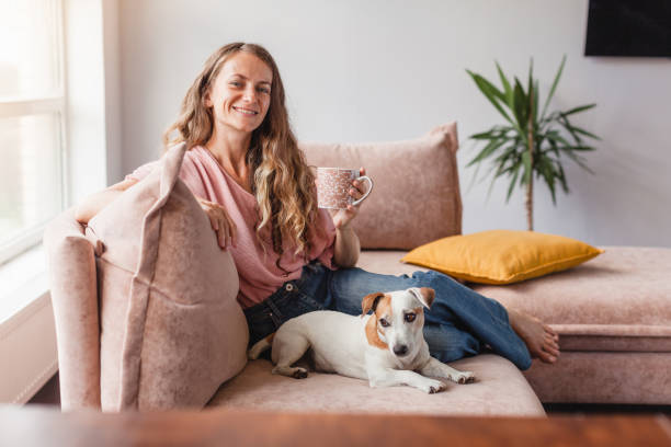 istock Calm and peaceful middle-aged woman takes a cup 1414823492