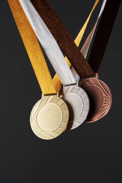 istock real Gold, silver and bronze medals  isolated on gray background. 1414825665