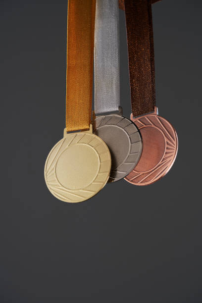 istock real Gold, silver and bronze medals  isolated on gray background. 1414825667