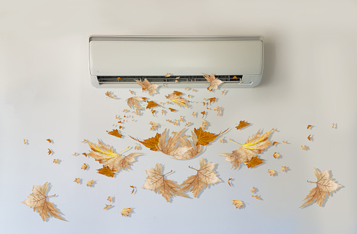 air condition aircondition air-condition on the white wall  modern dievice autum leave falling, energy