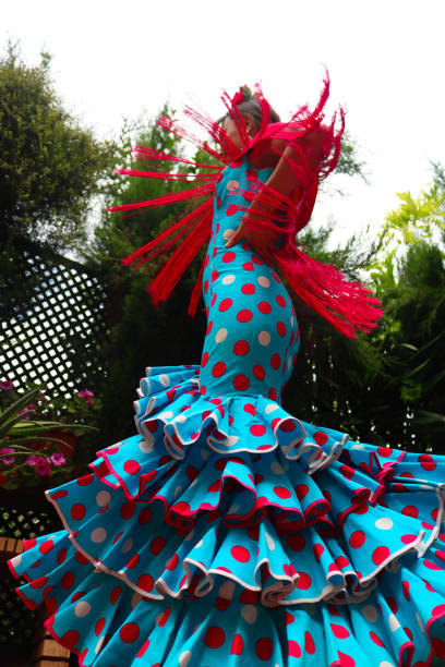 istock Girl dancing with regional dress 1414826768