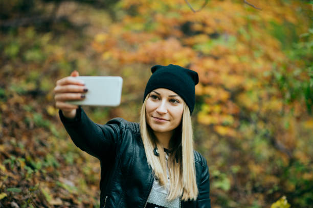 istock Happy woman hiking in mountains 1414828108