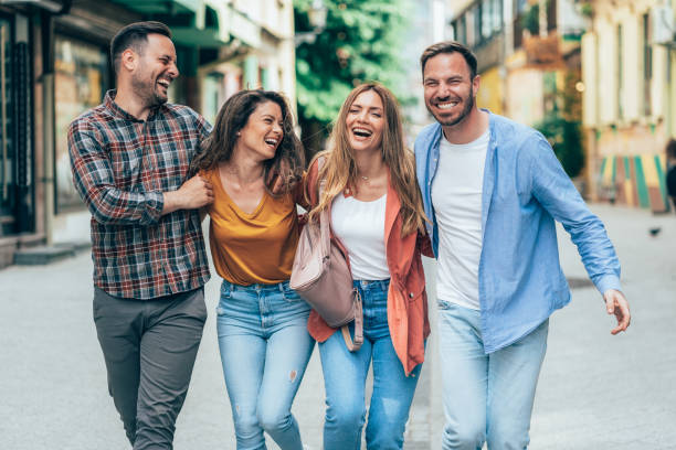 istock Friends having fun outdoors in the city 1414828971