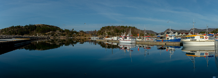 Lindesnes, Norway - April 17 2022: Fishing boats docked at Båly.