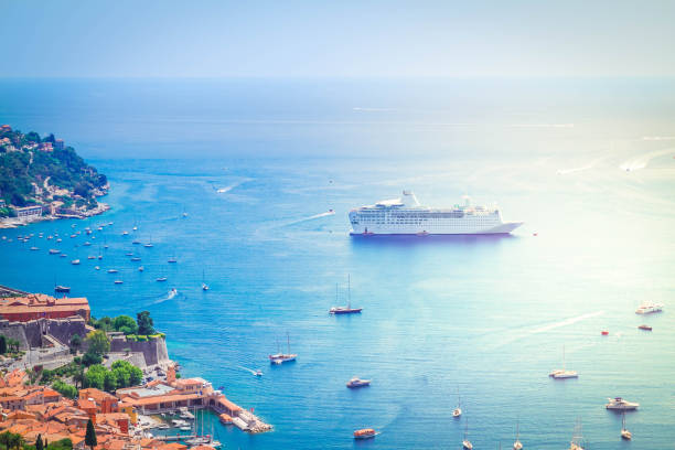 colorful coast and turquiose water with boats and ships, cote dAzur Provence, France, toned