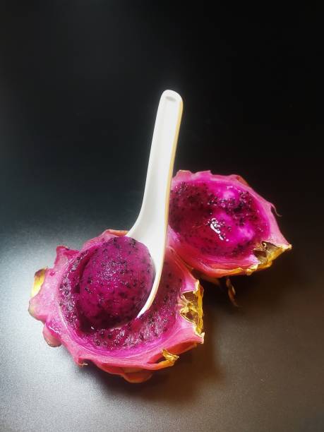 istock The dragon fruit on the background. 1414832095