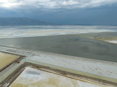 Aerial view of salt ponds and suplhur ponds. Taken via drone. Acigol Lake (Acı Göl) in Turkey.