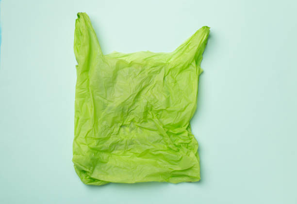 istock Disposable plastic bag on color background, top view 1414833508