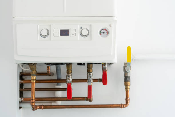 caldeira com painel de controle e tubos na cozinha - water heater energy efficiency heat resourceful - fotografias e filmes do acervo