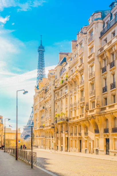 istock eiffel tour and Paris street 1414838979
