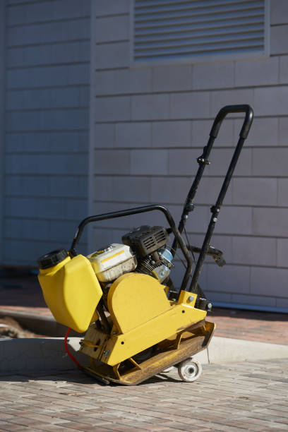istock Vibrating plate for compacting ground and sand, Construction equipment 1414839728