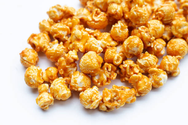 istock Honey caramel popcorn on white background. 1414841029