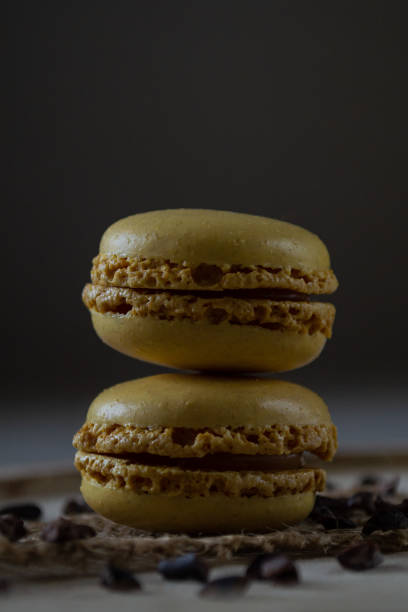istock a pyramid of two lemon macaroons on a dark background 1414841655