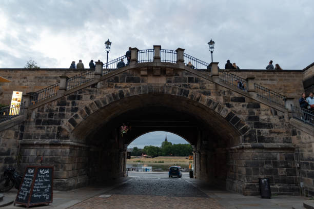 Dresden, Saxon, Germany, July 10, 2022 Historic stone bridge in the old town in the late evening