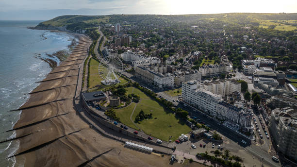 Aerial view of a seaside and beach of Eastbourne, East Sussex, UK Aerial view of a seaside and beach of Eastbourne, East Sussex, UK eastbourne pier photos stock pictures, royalty-free photos & images