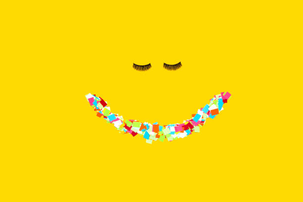 colorful mouth and eyelashes, creative art smile, yellow background