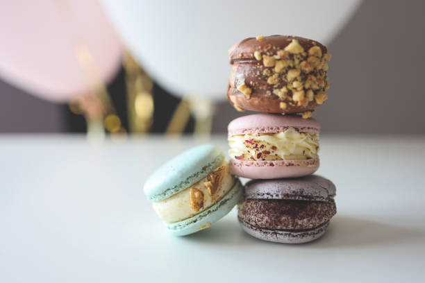 istock Macaroons close-up on a white table in a cafe 1414846581