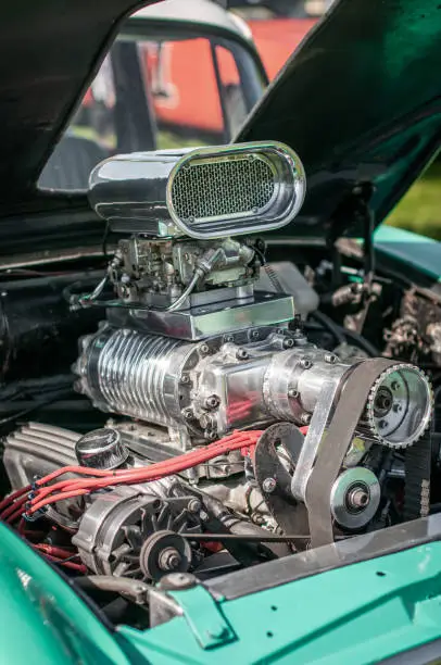 Big supercharged V8 in a classic, vintage drag car