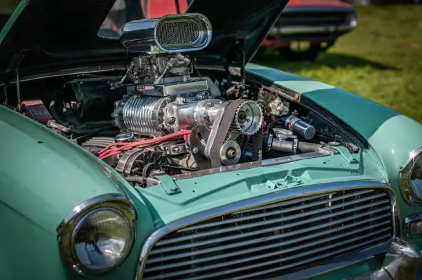 Big supercharged V8 in a classic, vintage drag car