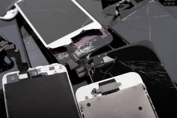istock A heap with the various broken screens lying one on top of another. Devices are prepared for utilization 1414863184
