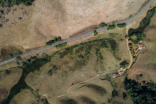 Aerial view of road in farms area