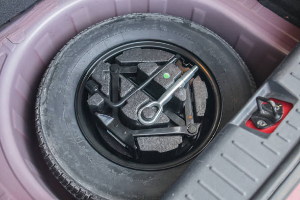 istock spare tire in the modern compact car 1414866358