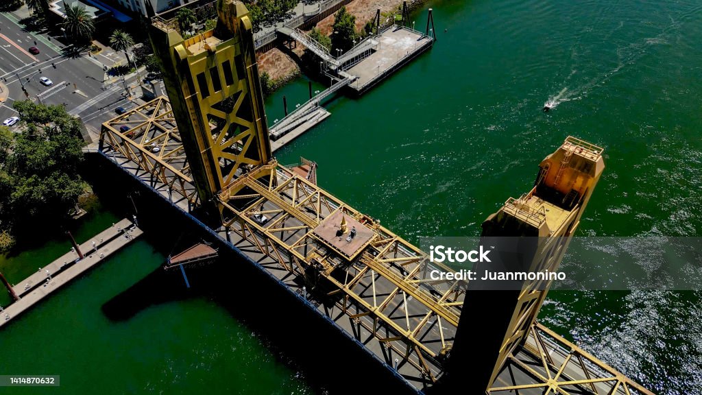 Aerial View of Tower Bridge over Sacramento River in Sacramento, California Downtown, from above Aerial View of Tower Bridge over Sacramento River in Sacramento Downtown, California , from above Aerial View Stock Photo