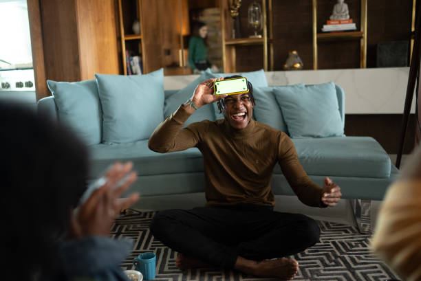 Friends playing guessing game at home