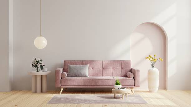 istock Scandinavian living room with pink sofa on empty white wall background. 1414872311
