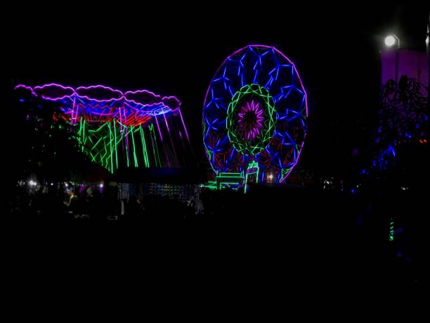 istock Windmill rides at the night market 1414872962
