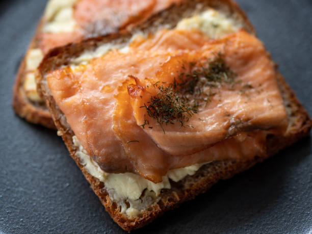 Cooked salmon and cheese on toast bread