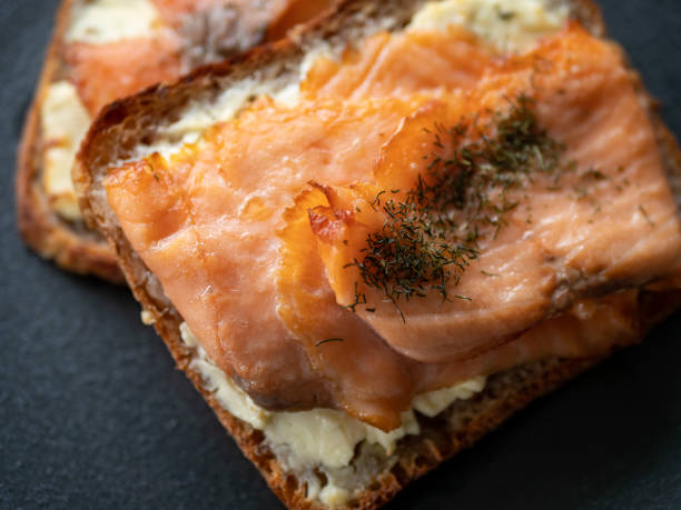 Cooked salmon and cheese on toast bread