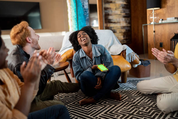 istock Friends having fun together at home 1414873829