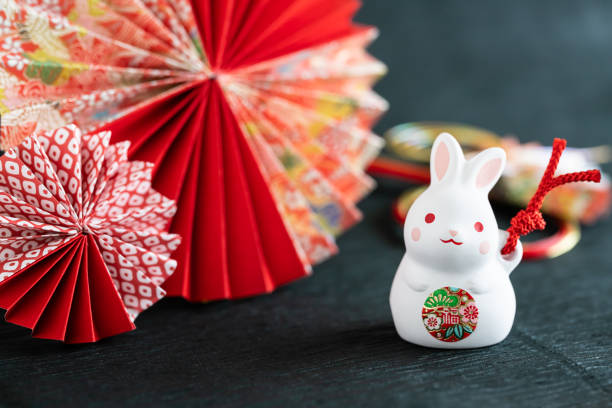 2023 New Year's card with a cute rabbit 2023 Year of the Rabbit New Year's card Gorgeous Japanese paper rabbit animal photos stock pictures, royalty-free photos & images