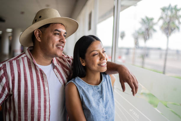 istock Traveler couple contemplating looking away 1414879918
