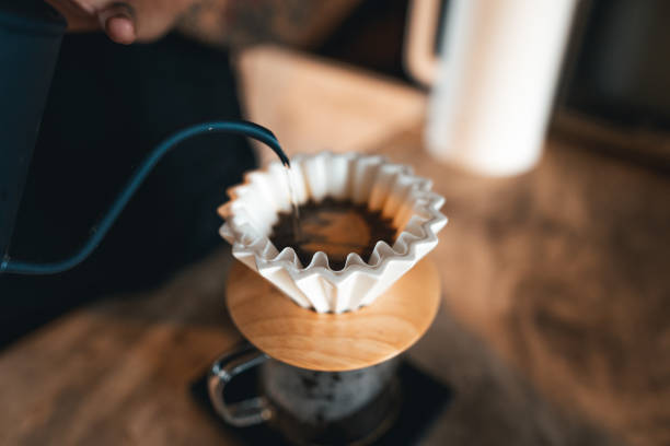 istock Closeup of hands barista make coffee 1414887962
